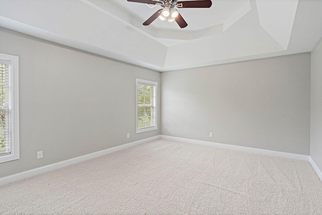 1005 Brittain Downs Dr, Nolensville, TN 37135 - carpeted spare room featuring a raised ceiling, a ceiling fan, and baseboards