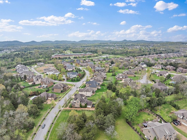 1005 Brittain Downs Dr, Nolensville, TN 37135 - aerial overview of property's location with mountains and nearby suburban area