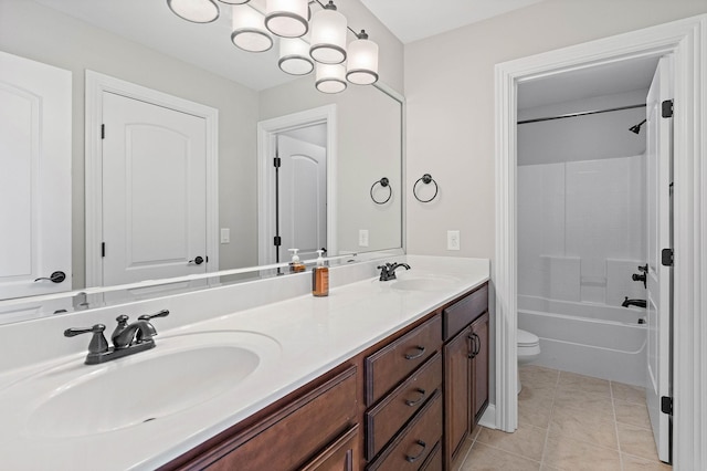 1005 Brittain Downs Dr, Nolensville, TN 37135 - full bathroom featuring toilet, double vanity, shower / tub combination, and tile patterned flooring