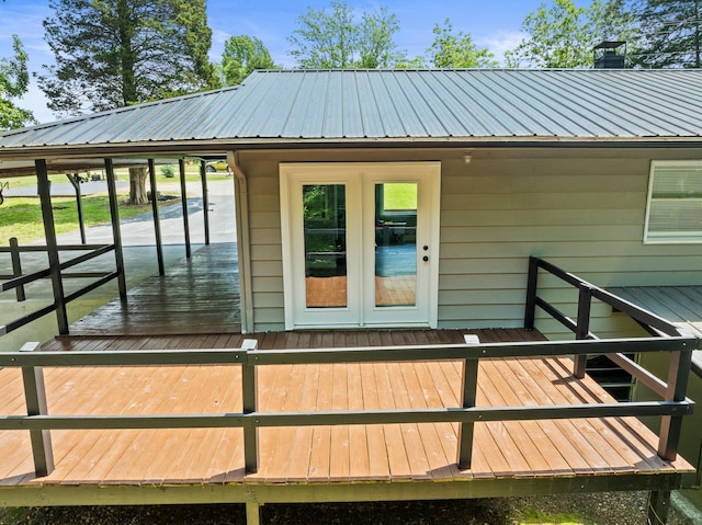 5538 Lexie Beans Creek Rd, Belvidere, TN 37306 - doorway to property with metal roof, french doors, a chimney, and a deck