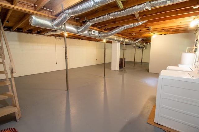 5538 Lexie Beans Creek Rd, Belvidere, TN 37306 - unfinished basement with washing machine and clothes dryer