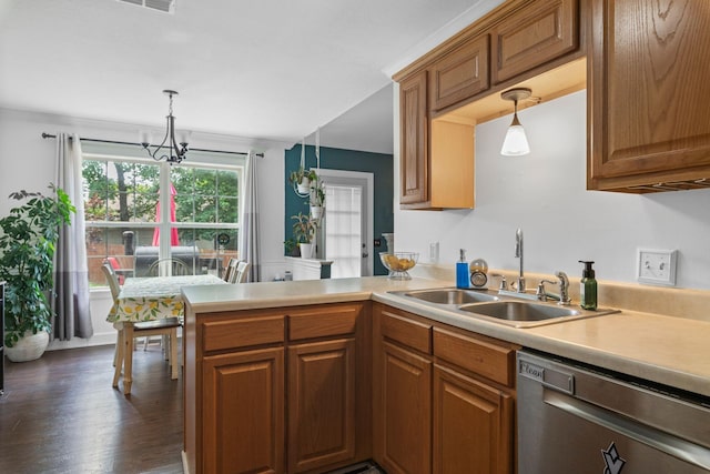 917 Lavergne Ln, La Vergne, TN 37086 - kitchen featuring stainless steel dishwasher, a sink, a chandelier, light countertops, and pendant lighting