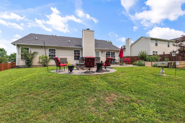 917 Lavergne Ln, La Vergne, TN 37086 - back of property with a patio and a chimney