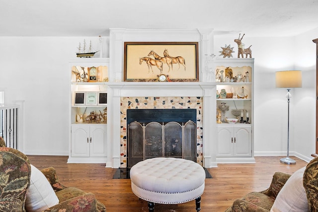 1899 Berrys Chapel Ct, Franklin, TN 37069 - living room with a tile fireplace, wood finished floors, and baseboards