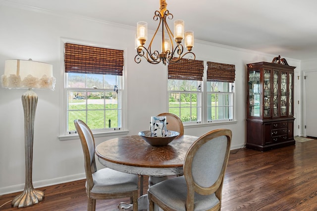 1899 Berrys Chapel Ct, Franklin, TN 37069 - dining space featuring healthy amount of natural light, a chandelier, ornamental molding, wood finished floors, and baseboards