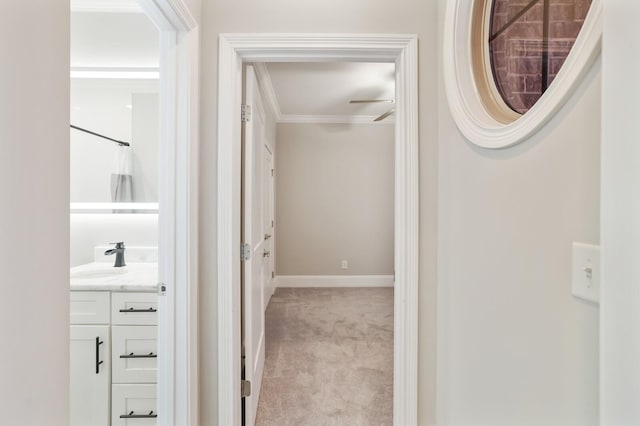212 Lotus Ct, Hendersonville, TN 37075 - hall featuring carpet floors, a sink, ornamental molding, and baseboards