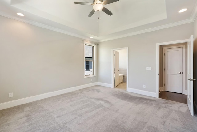 212 Lotus Ct, Hendersonville, TN 37075 - unfurnished bedroom with a tray ceiling, recessed lighting, ornamental molding, carpet floors, and baseboards