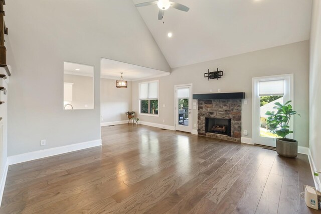 212 Lotus Ct, Hendersonville, TN 37075 - unfurnished living room featuring a fireplace, plenty of natural light, high vaulted ceiling, ceiling fan, and wood finished floors