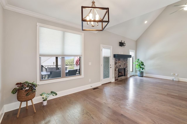 212 Lotus Ct, Hendersonville, TN 37075 - unfurnished living room with healthy amount of natural light, a chandelier, wood finished floors, baseboards, and high vaulted ceiling
