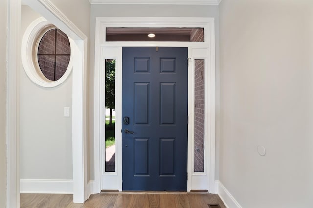 212 Lotus Ct, Hendersonville, TN 37075 - entrance foyer featuring baseboards, wood finished floors, and ornamental molding