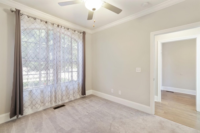 212 Lotus Ct, Hendersonville, TN 37075 - empty room with crown molding, ceiling fan, baseboards, and a smoke detector