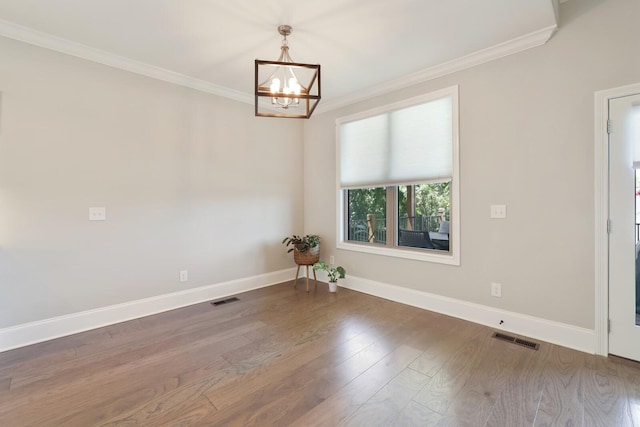 212 Lotus Ct, Hendersonville, TN 37075 - unfurnished room with a chandelier, ornamental molding, baseboards, and wood finished floors