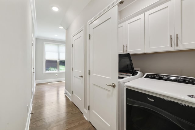 212 Lotus Ct, Hendersonville, TN 37075 - washroom featuring cabinet space, light wood finished floors, recessed lighting, and baseboards