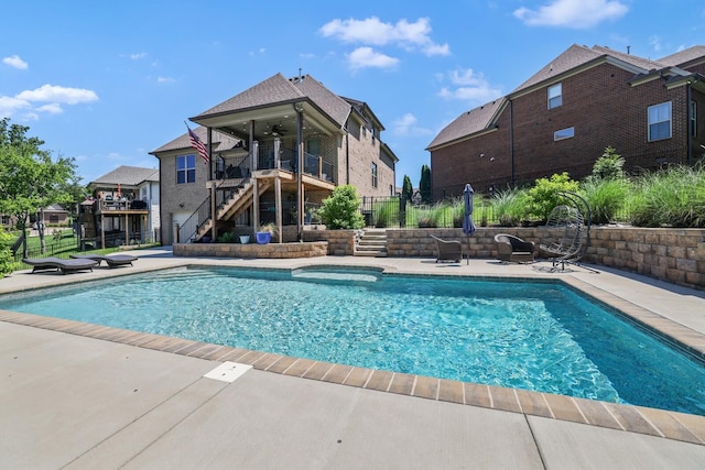 212 Lotus Ct, Hendersonville, TN 37075 - swimming pool featuring stairway, a ceiling fan, and a patio