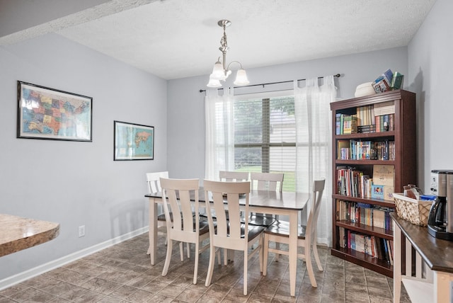 4115 Giacomo Dr, Murfreesboro, TN 37128 - dining space with a chandelier, a textured ceiling, and baseboards