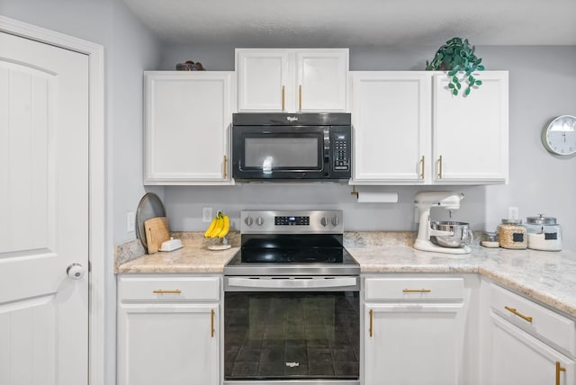 4115 Giacomo Dr, Murfreesboro, TN 37128 - kitchen featuring black microwave, stainless steel electric stove, and white cabinets