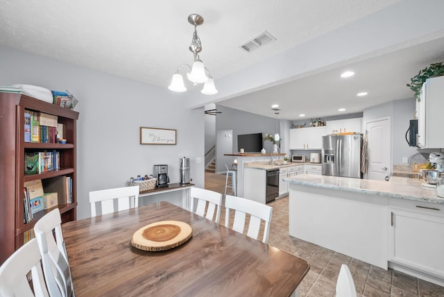 4115 Giacomo Dr, Murfreesboro, TN 37128 - dining space featuring stairway, recessed lighting, and a chandelier