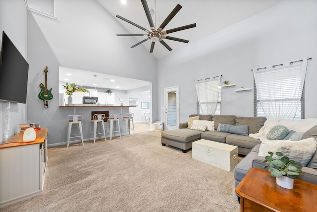 4115 Giacomo Dr, Murfreesboro, TN 37128 - living area with a ceiling fan, high vaulted ceiling, light colored carpet, and baseboards