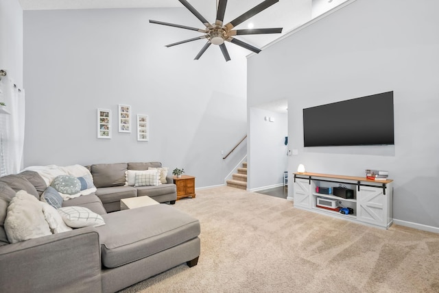 4115 Giacomo Dr, Murfreesboro, TN 37128 - carpeted living room featuring stairs, a ceiling fan, high vaulted ceiling, and baseboards