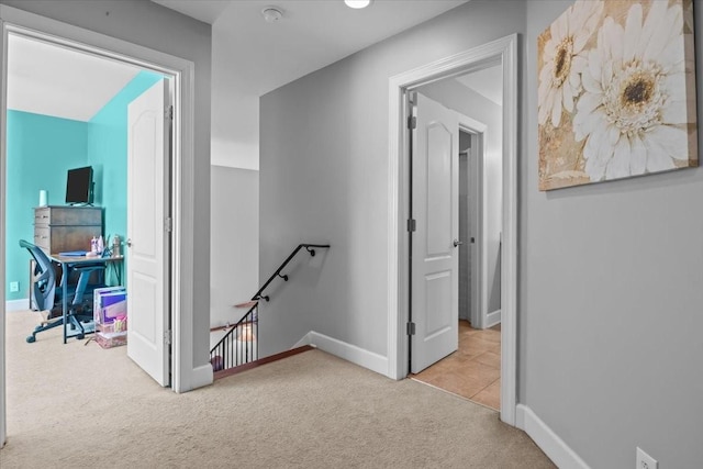 3699 Prestwicke Pl, Adams, TN 37010 - hall featuring an upstairs landing, carpet flooring, and baseboards