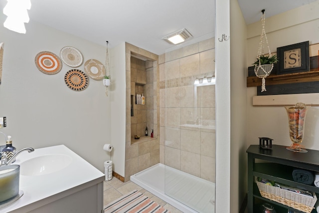 860 Old Woodbury Pike, Readyville, TN 37149 - bathroom with tiled shower, tile patterned floors, vanity, and baseboards