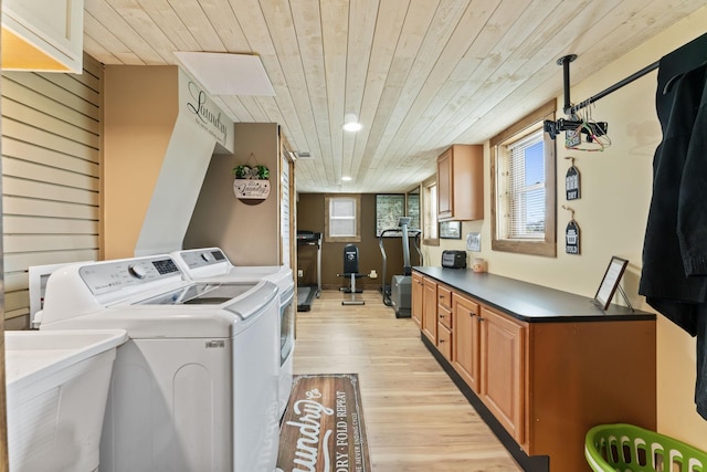 860 Old Woodbury Pike, Readyville, TN 37149 - washroom featuring separate washer and dryer, light wood-type flooring, wood ceiling, cabinet space, and plenty of natural light