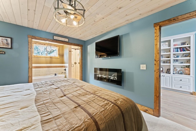 860 Old Woodbury Pike, Readyville, TN 37149 - carpeted bedroom with wooden ceiling and ensuite bathroom