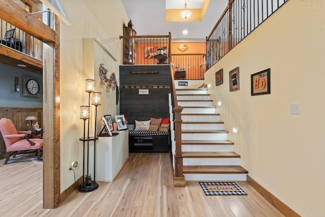 860 Old Woodbury Pike, Readyville, TN 37149 - staircase with a towering ceiling, wood finished floors, and baseboards