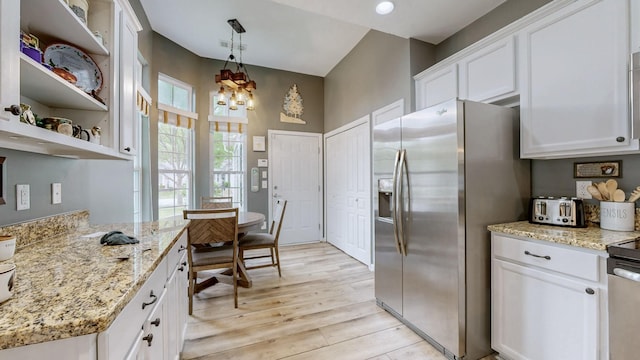 402 Cottonwood Dr, Mount Juliet, TN 37122 - kitchen with stainless steel refrigerator with ice dispenser, light wood-style flooring, white cabinets, a chandelier, and light stone counters