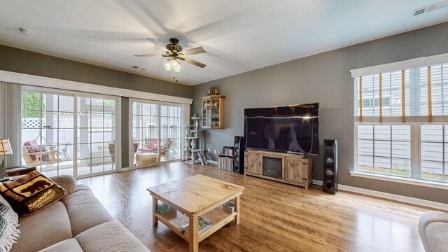 402 Cottonwood Dr, Mount Juliet, TN 37122 - living area featuring baseboards, a ceiling fan, and wood finished floors