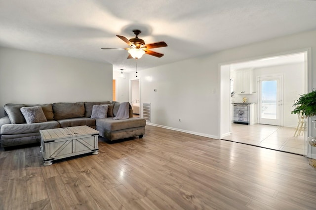1864 Sawgrass Ln, Chapel Hill, TN 37034 - living room with ceiling fan, light wood-type flooring, and baseboards