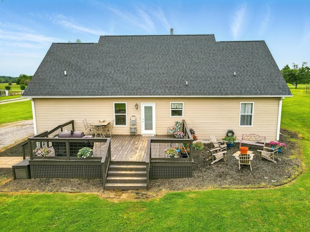 1864 Sawgrass Ln, Chapel Hill, TN 37034 - rear view of property featuring a lawn, a wooden deck, an outdoor living space with a fire pit, and a shingled roof