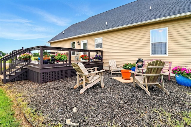 1864 Sawgrass Ln, Chapel Hill, TN 37034 - back of house featuring a fire pit, a wooden deck, a shingled roof, and stairs