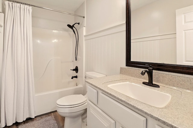 1864 Sawgrass Ln, Chapel Hill, TN 37034 - full bath with toilet, vanity, shower / bath combination with curtain, wood finished floors, and a wainscoted wall