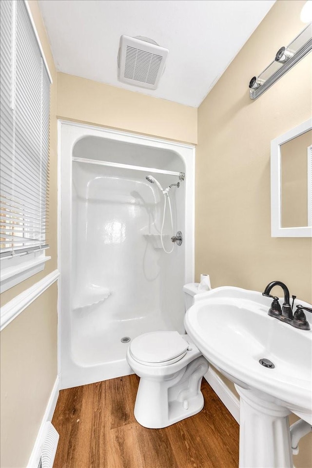 183 Prairie Plains Rd, Hillsboro, TN 37342 - bathroom with wood finished floors, a walk in shower, toilet, and a sink