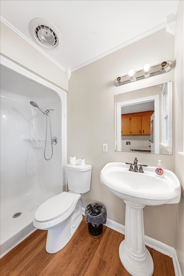 183 Prairie Plains Rd, Hillsboro, TN 37342 - full bathroom with wood finished floors, ornamental molding, walk in shower, toilet, and baseboards