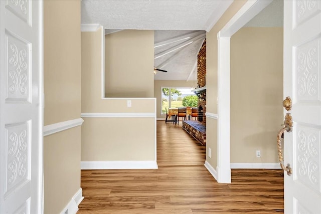 183 Prairie Plains Rd, Hillsboro, TN 37342 - foyer with wood finished floors, a textured ceiling, and baseboards