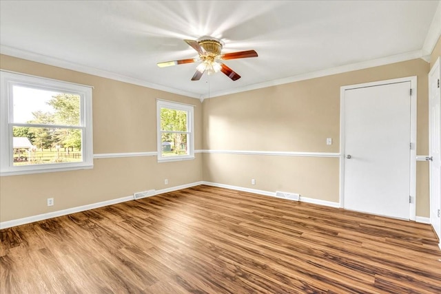 183 Prairie Plains Rd, Hillsboro, TN 37342 - empty room with ceiling fan, wood finished floors, ornamental molding, and baseboards