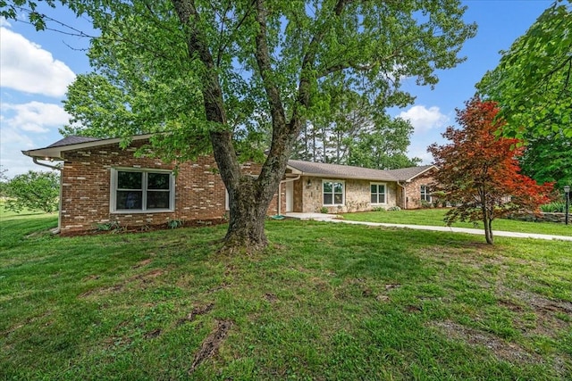 183 Prairie Plains Rd, Hillsboro, TN 37342 - single story home with a front yard and brick siding