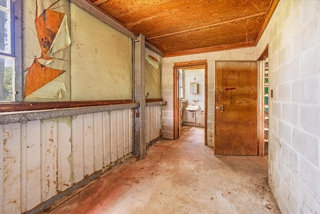 183 Prairie Plains Rd, Hillsboro, TN 37342 - hallway with concrete floors and concrete block wall