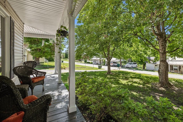 123 Columbia Ave, Centerville, TN 37033 - wooden porch with a yard