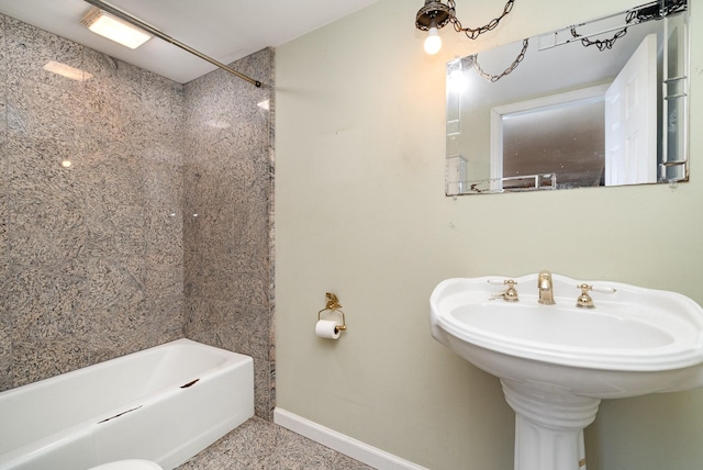942 Youngs Ln, Nashville, TN 37207 - bathroom with baseboards and shower / bath combination