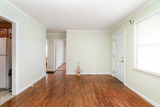 942 Youngs Ln, Nashville, TN 37207 - spare room featuring wood finished floors, crown molding, baseboards, and healthy amount of natural light
