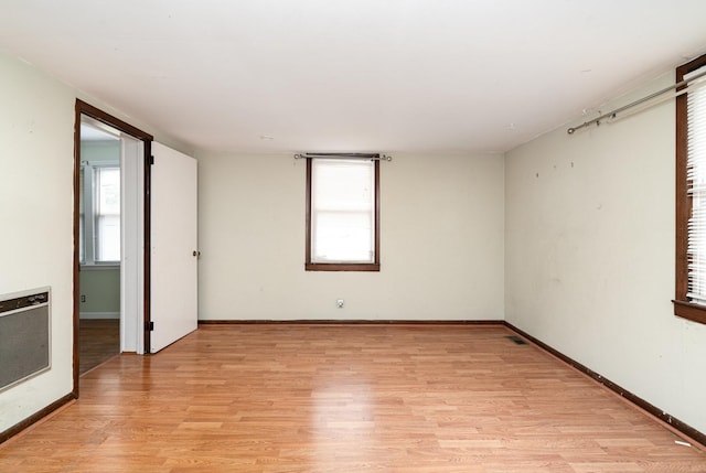 942 Youngs Ln, Nashville, TN 37207 - unfurnished room featuring light wood-style flooring, baseboards, and heating unit