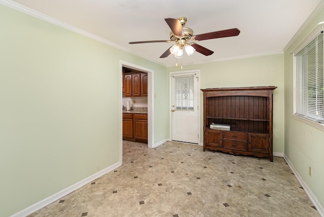 942 Youngs Ln, Nashville, TN 37207 - unfurnished living room with crown molding, a ceiling fan, and baseboards