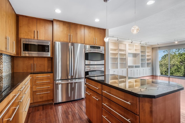 4215 Harding Pike Unit 601, Nashville, TN 37205 - kitchen with stainless steel appliances, dark wood-style floors, brown cabinetry, decorative backsplash, and recessed lighting
