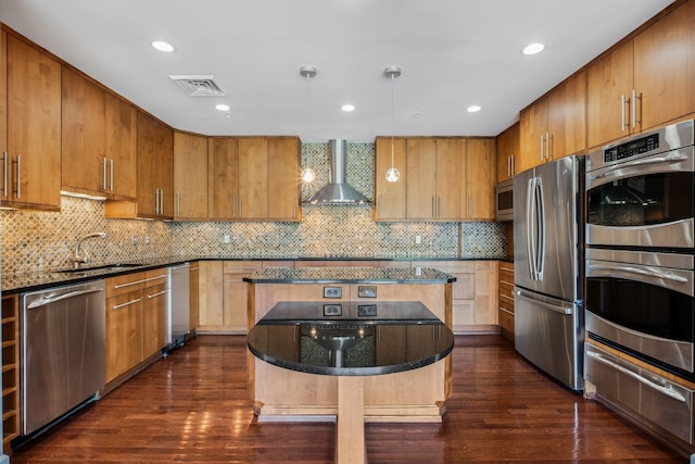4215 Harding Pike Unit 601, Nashville, TN 37205 - kitchen featuring appliances with stainless steel finishes, wall chimney range hood, a sink, a warming drawer, and a center island