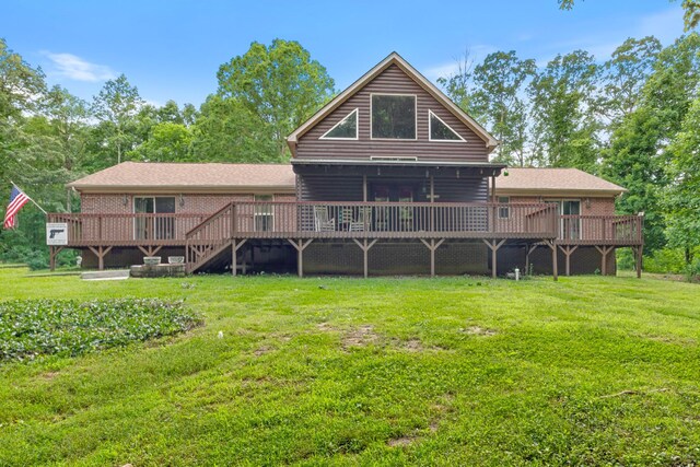 4357 Old Blacktop Rd, Mc Ewen, TN 37101 - rear view of house with a wooden deck, a yard, and brick siding