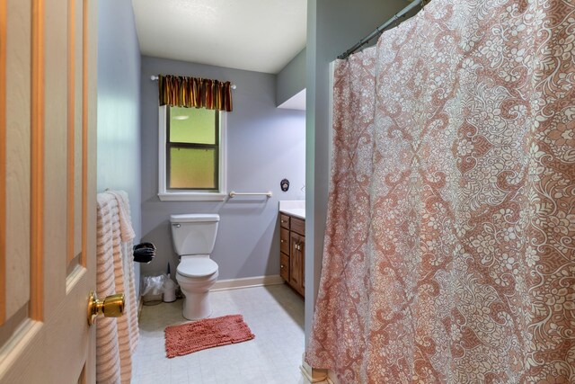 4357 Old Blacktop Rd, Mc Ewen, TN 37101 - full bathroom featuring vanity, toilet, baseboards, and a shower with curtain