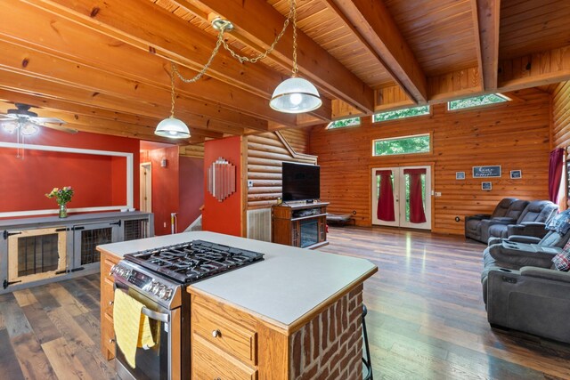 4357 Old Blacktop Rd, Mc Ewen, TN 37101 - kitchen featuring stainless steel range with gas cooktop, open floor plan, dark wood-type flooring, a ceiling fan, and wood ceiling with exposed beams